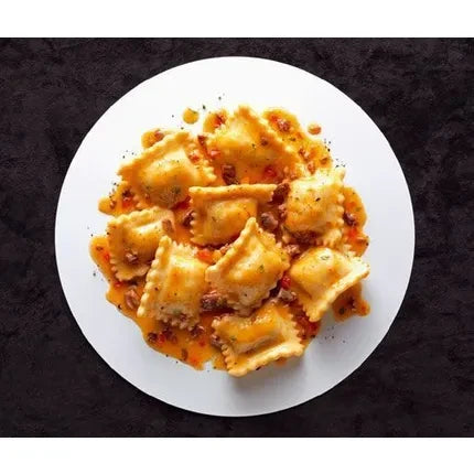 RAVIOLI AU CONFIT DE CANARD ET À LA SAUCE BOLOGNAISE